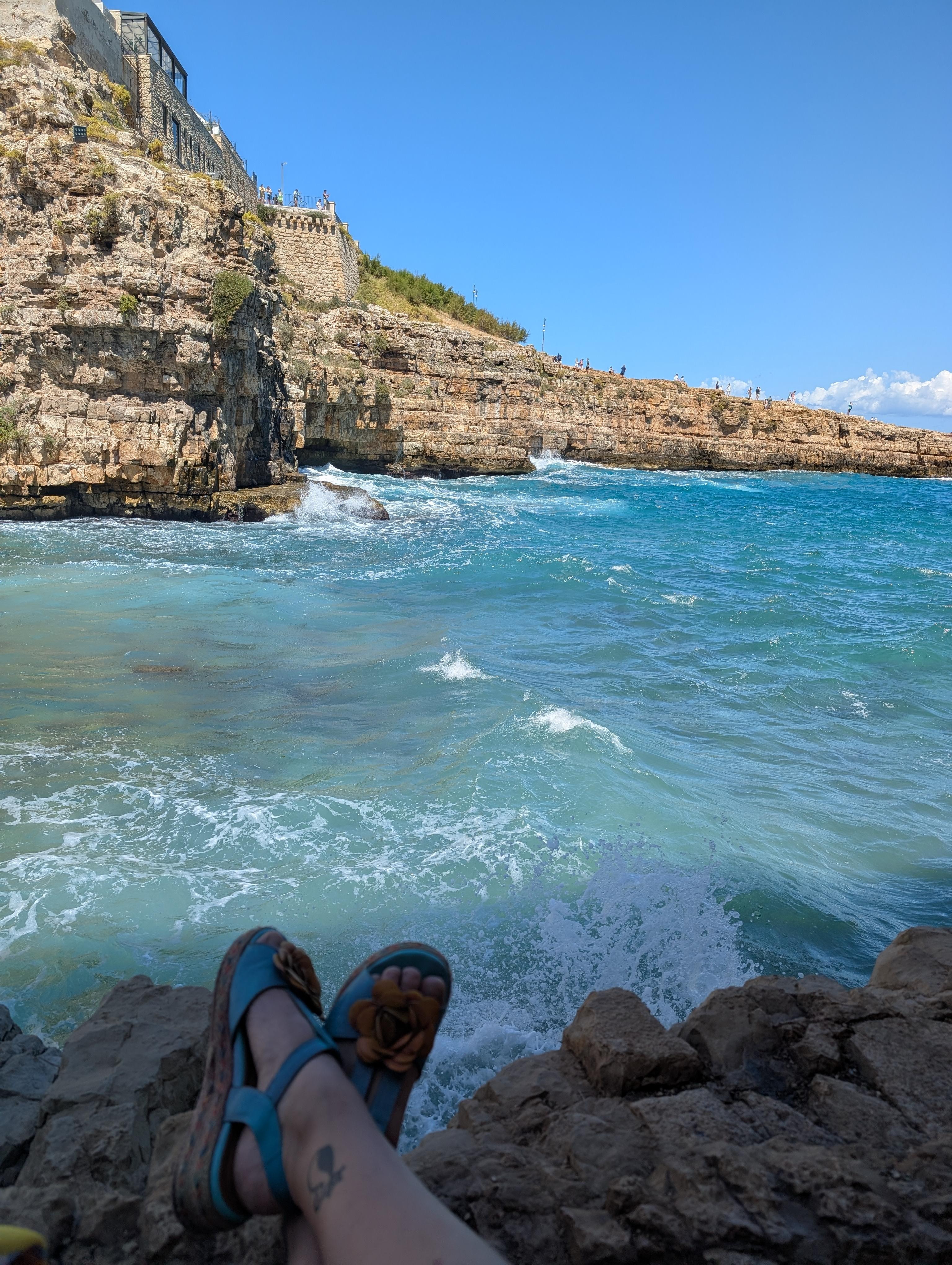Closest beach, always filled with people on the land but if you swim out... Amazing to be between the cliffs!