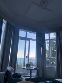 View from our large front 1 st floor room with large terrace plus 2 sun beds, table and 2 chairs