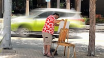 Cool picture of Live Local Artist as he’s making a painting