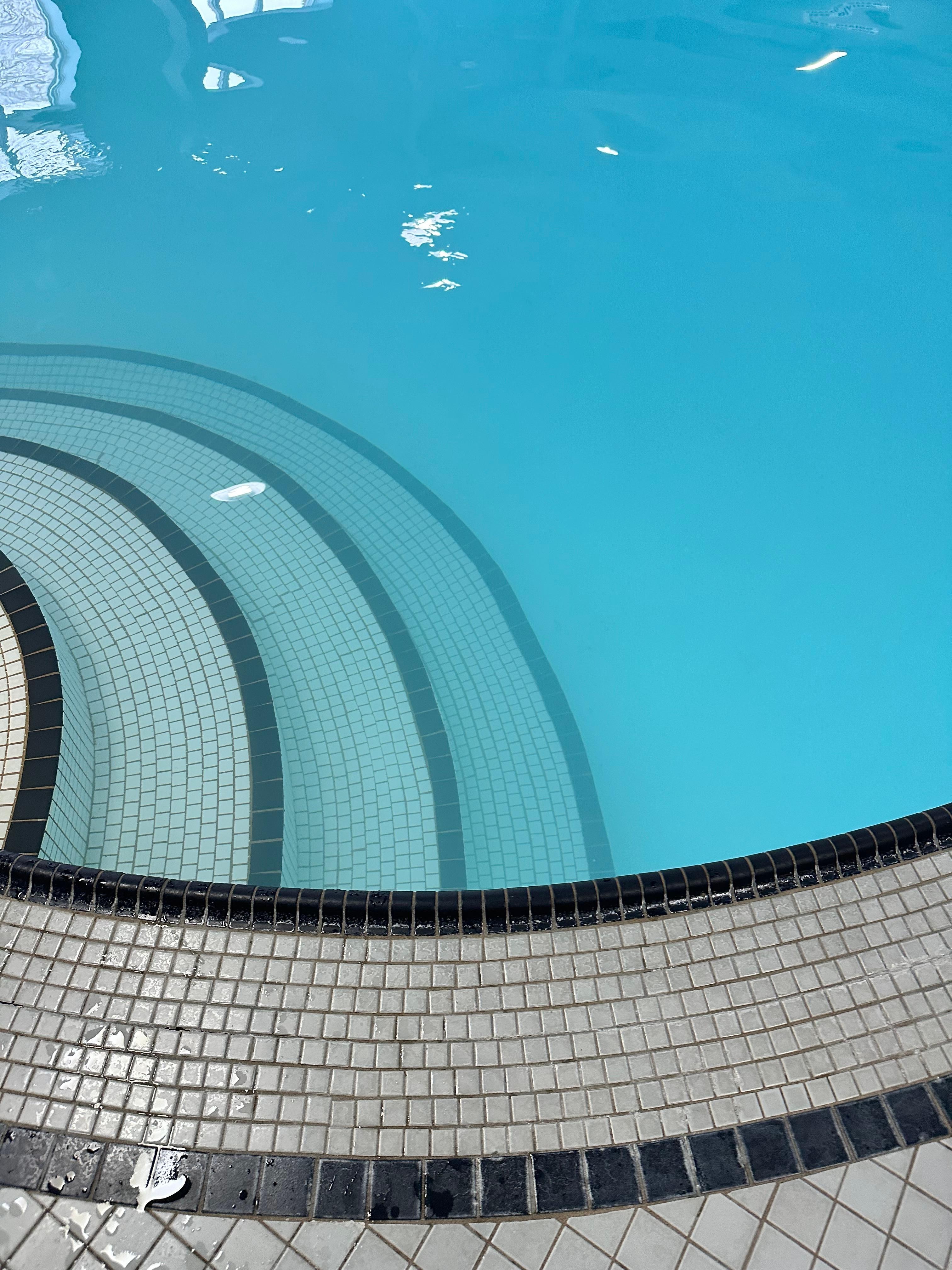 Cloudy pool water...couldn't bring myself to photograph the dead spider and floating hair clumps.