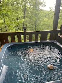 The hot tub overlooking the view