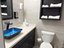 Bathroom/shower area is clean with great water pressure.