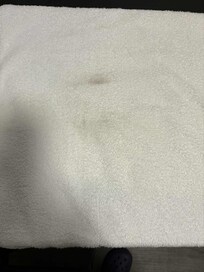 Towel hanging in the bathroom is obviously not washed