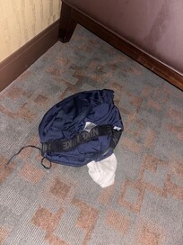 Precious guest dirty sock and shorts left on floor