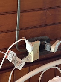 Overloaded outlets above headboard