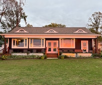 Setting sun reflection on home.