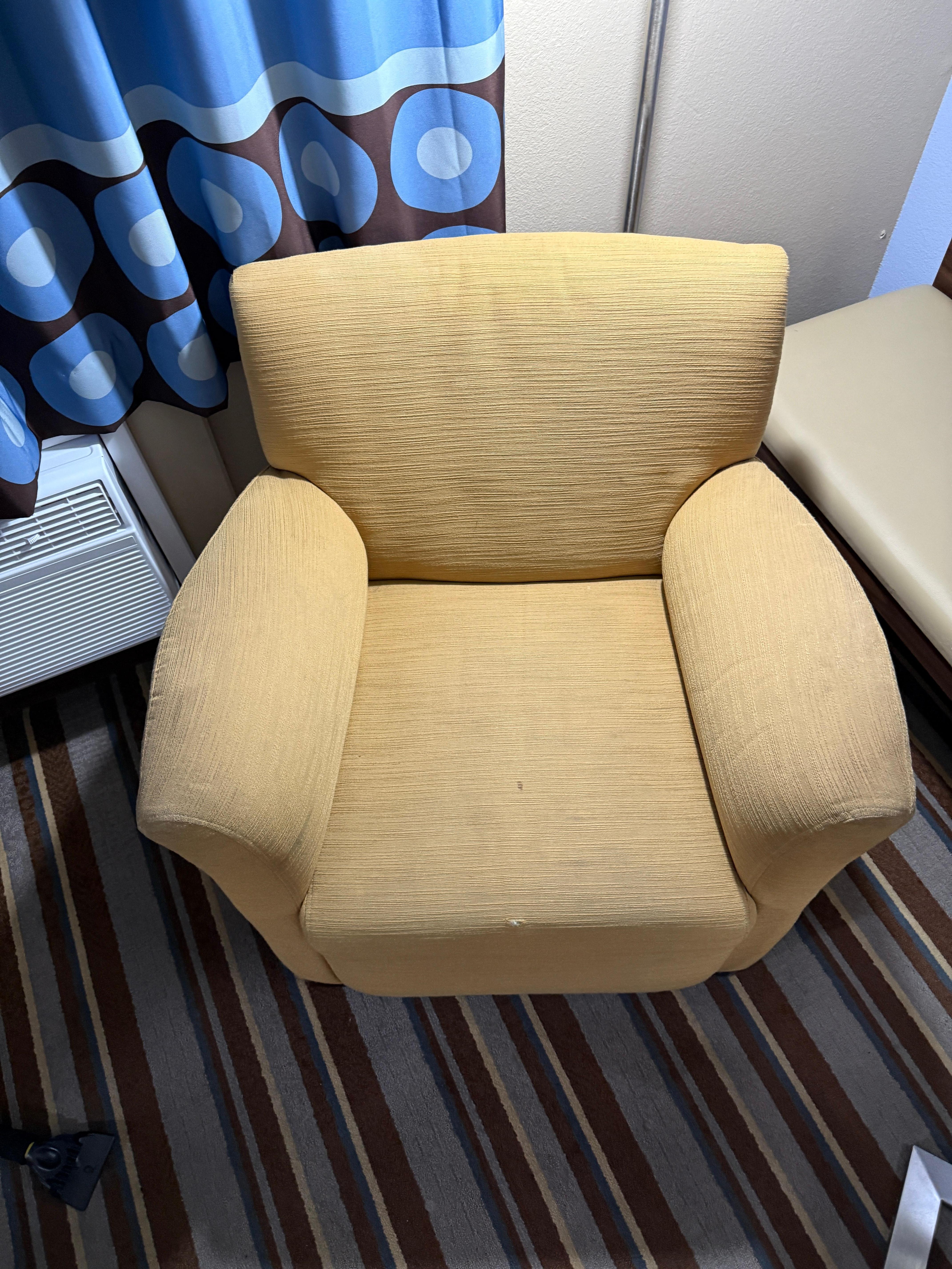 Notably dirty and stained chair. 