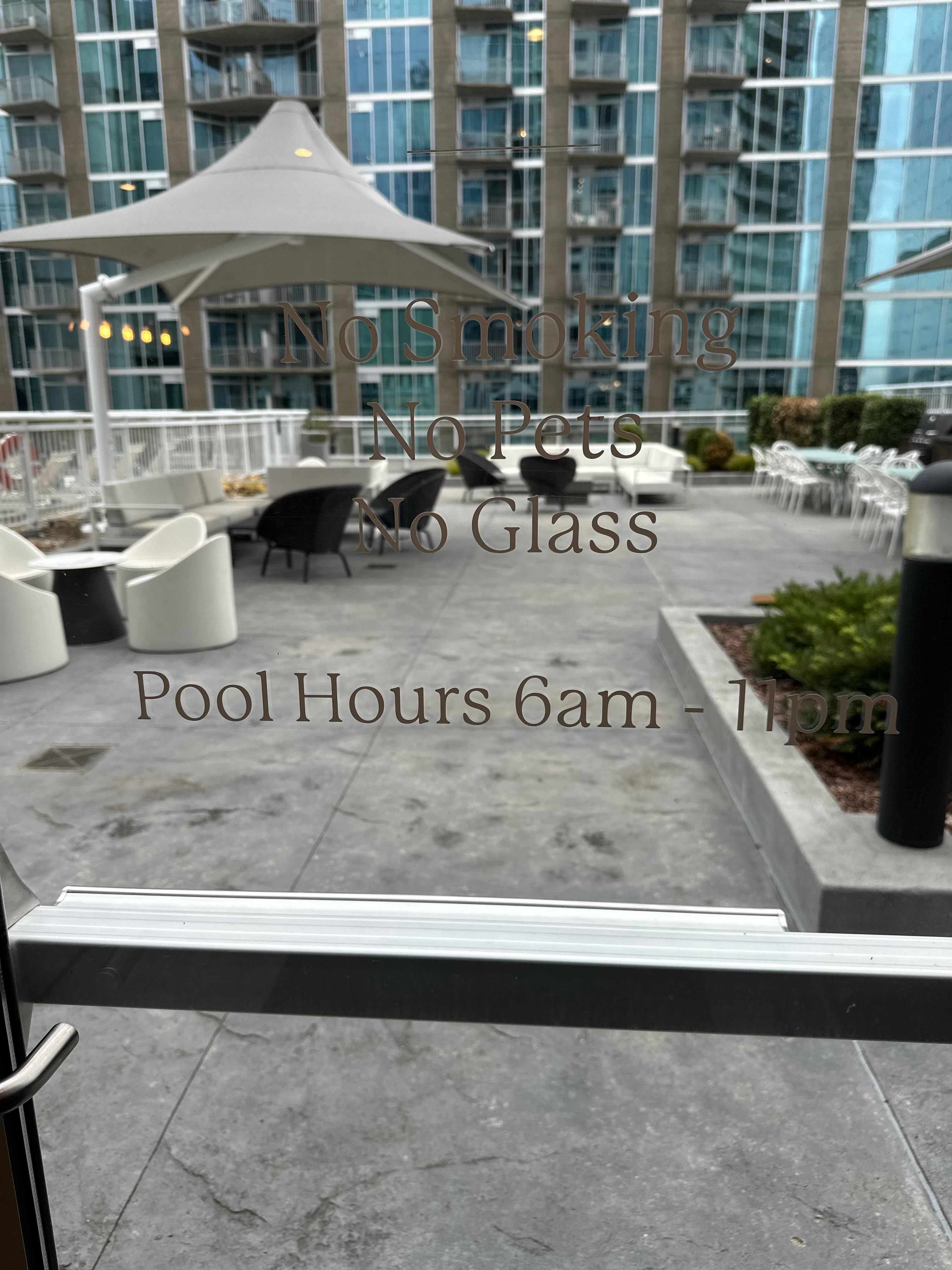 Sitting/sunning area near pool