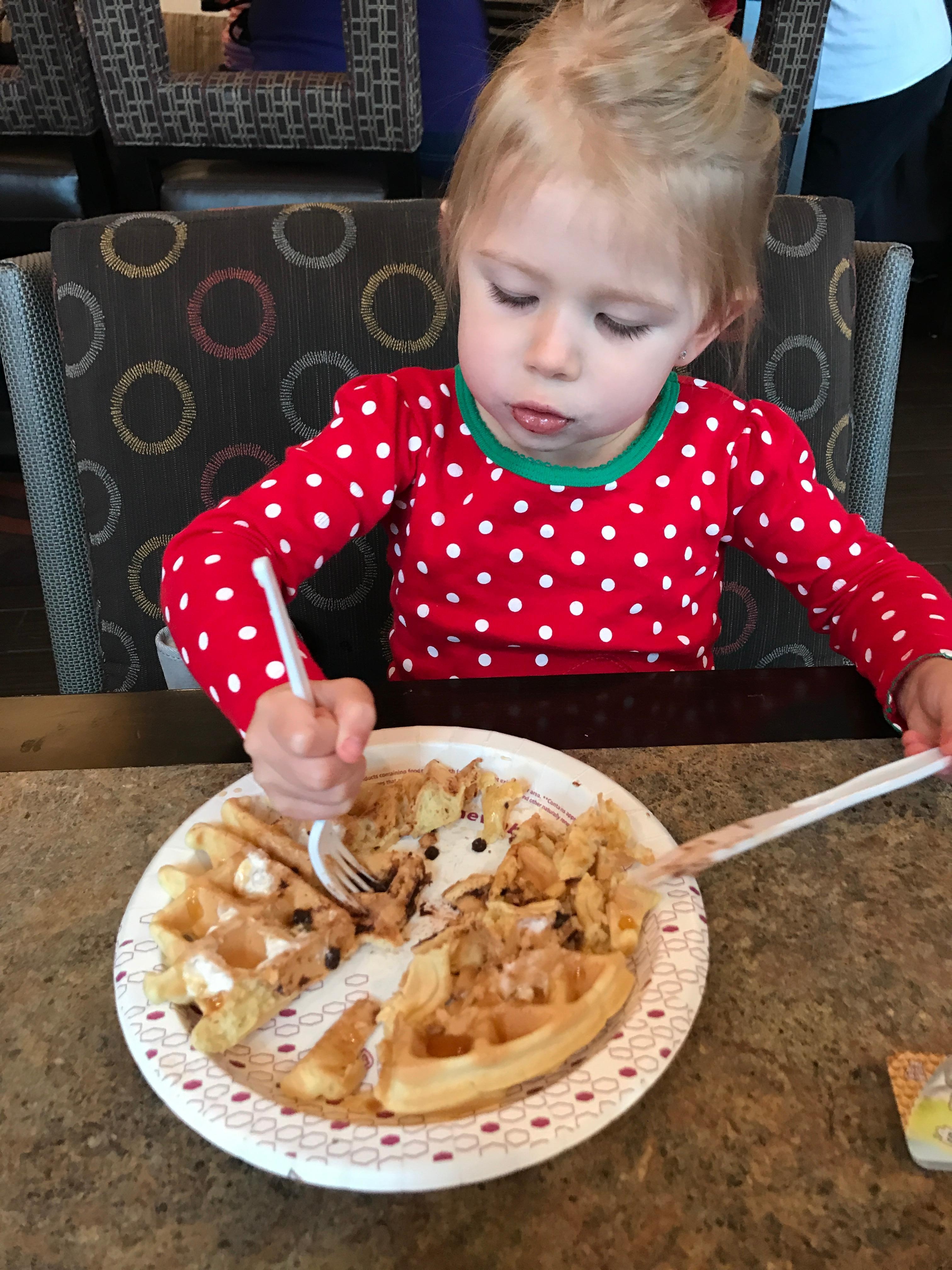 Loving the waffle at breakfast with yummy toppings.