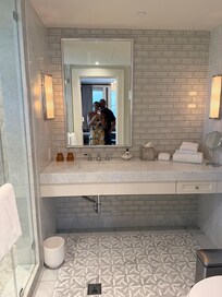 Bathroom with large marble shower.