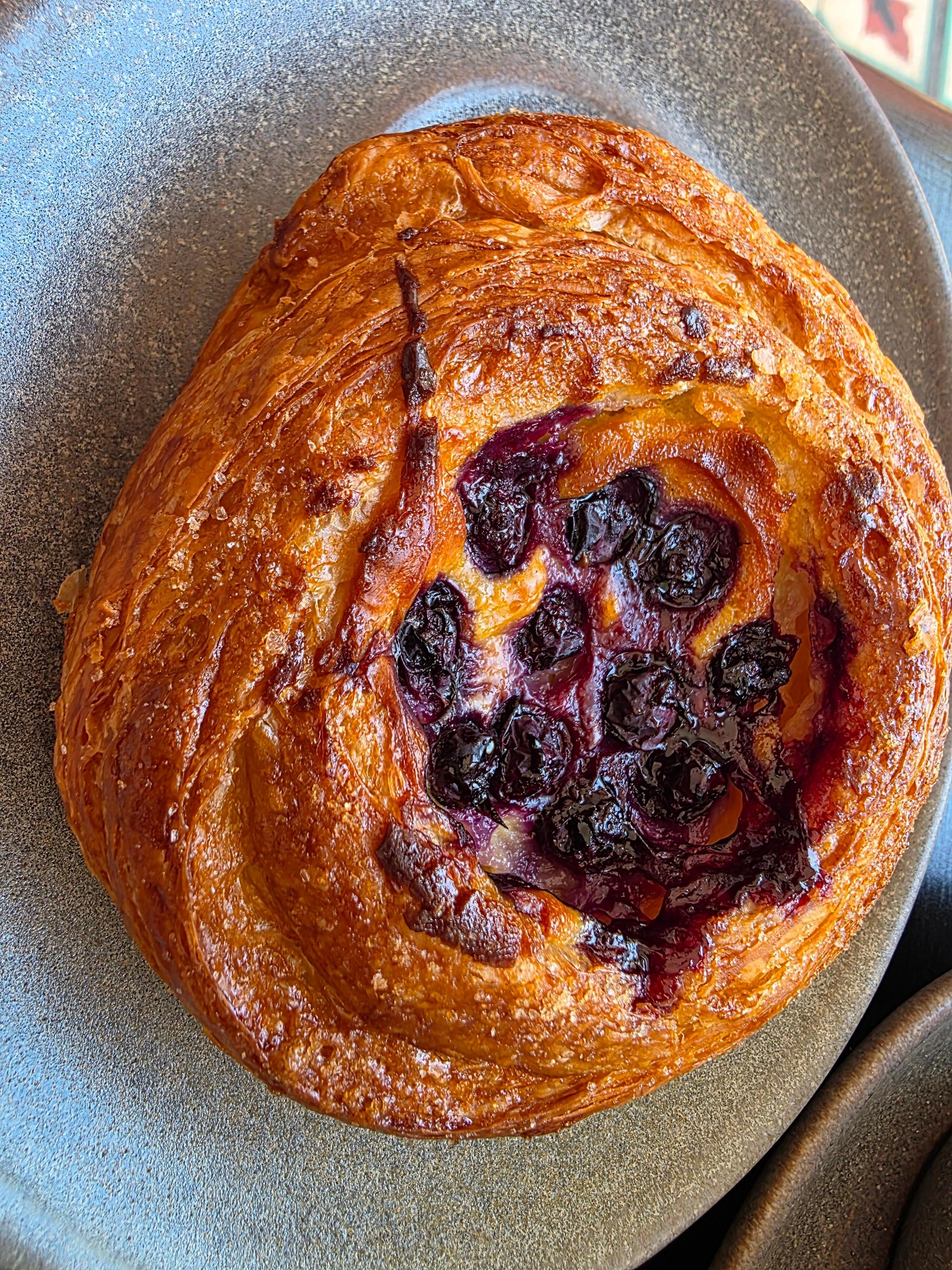 Pastry with blueberries and lemon cream center