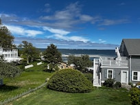 The beautiful grounds and the quarterdeck house on the right
