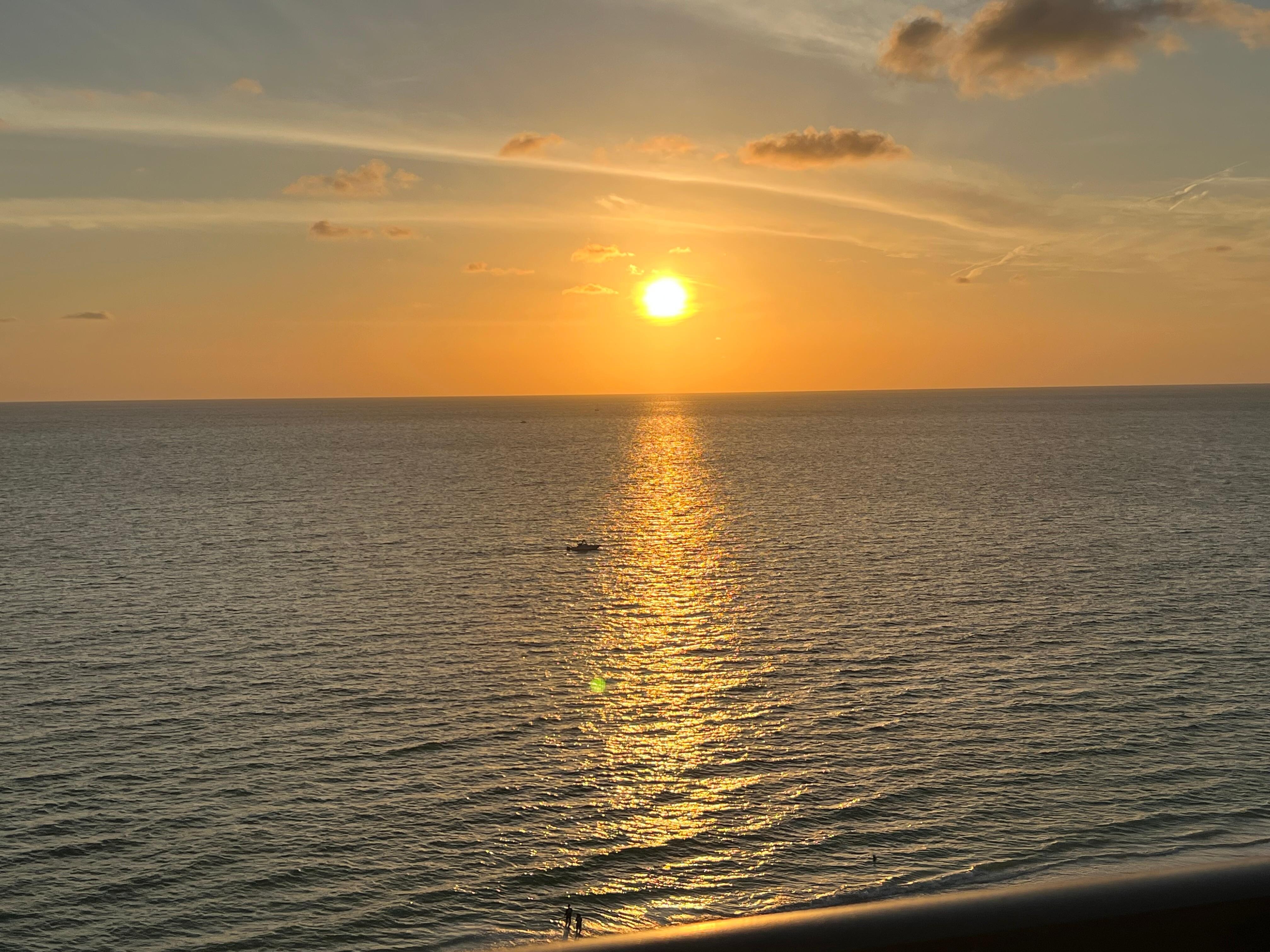 The view of the sunset from the balcony 