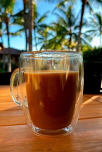 Coffee on the patio listening to the birds and wind through the palms.