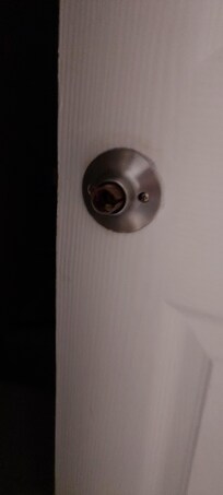 Doorknob not on bathroom door which wouldn't close anyway