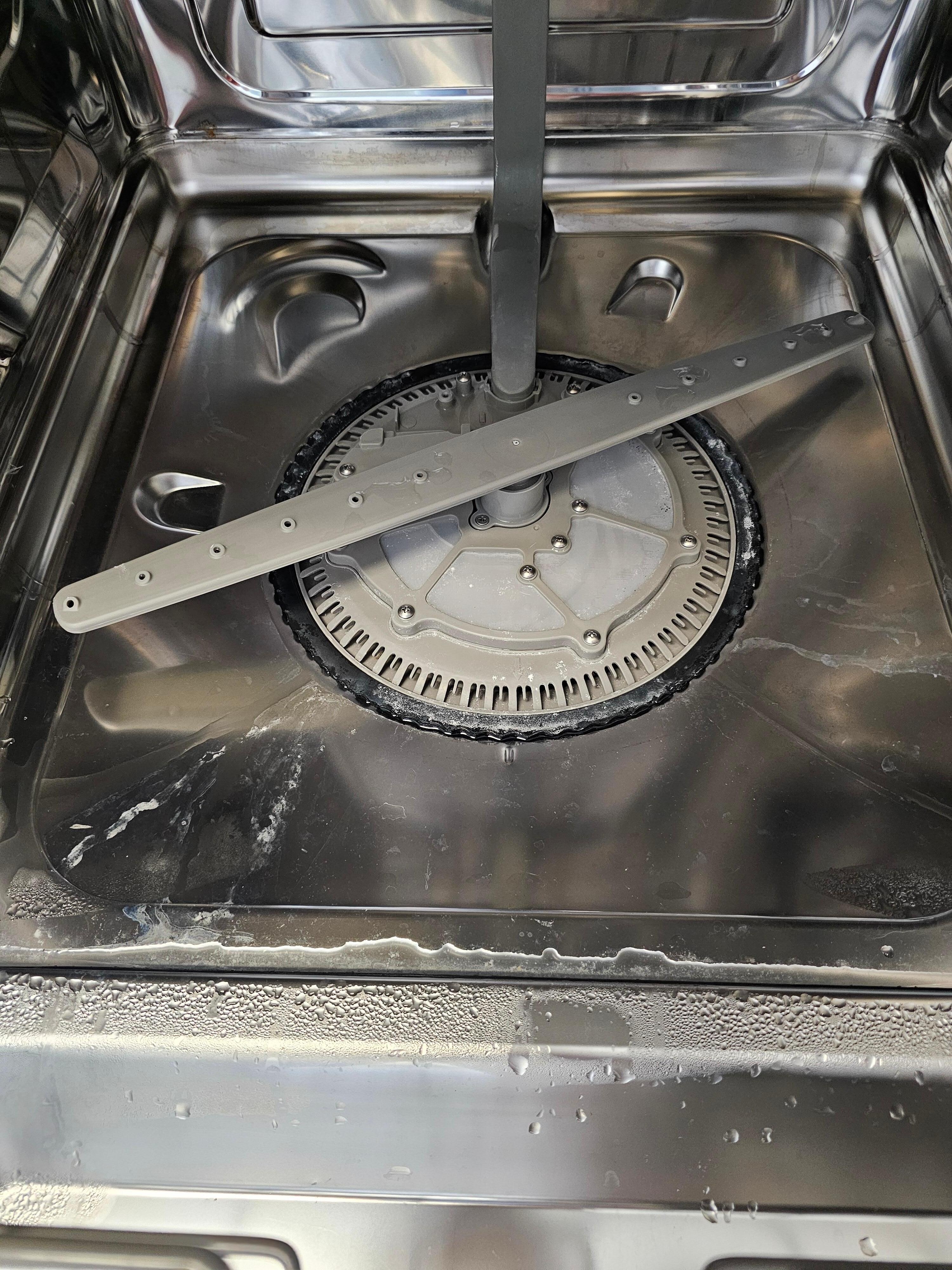 The dishwasher smell is from old food in the filter