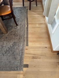 Pic of rug gripper that is not aligned with rug anymore,