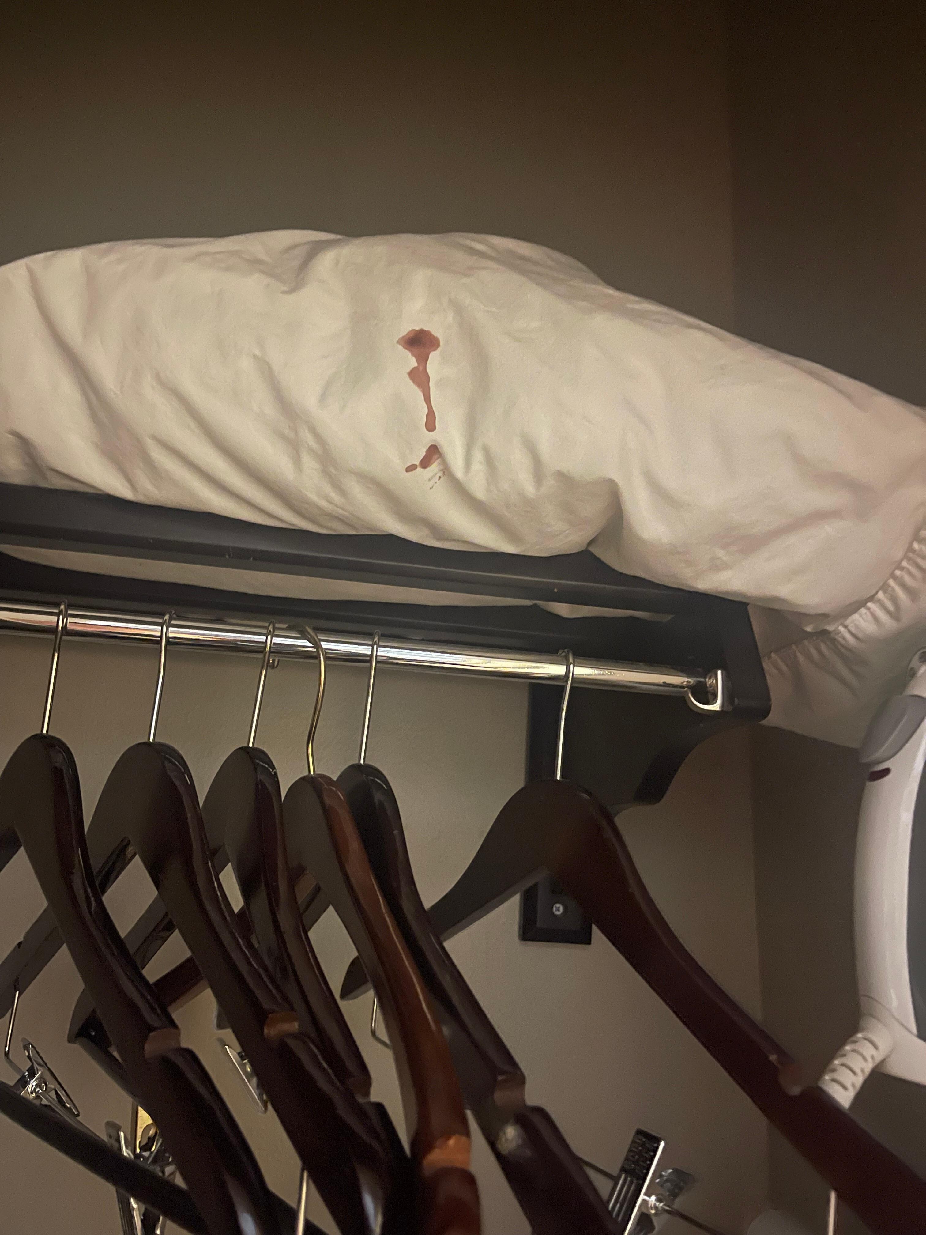 Old dried blood on a pillow hidden in the closet