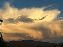 Great view of storms in the mountains and Santa Fe