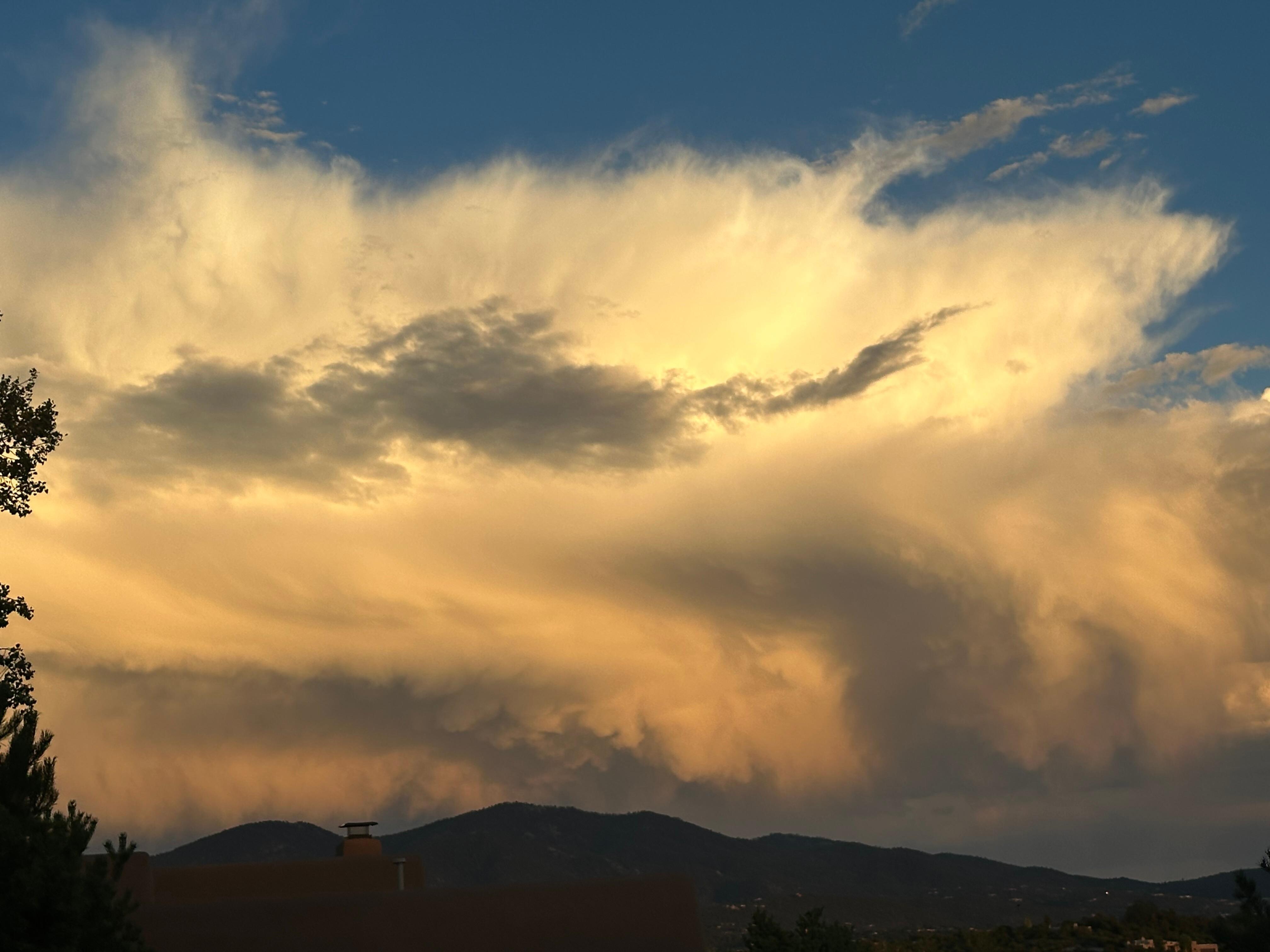Great view of storms in the mountains and Santa Fe