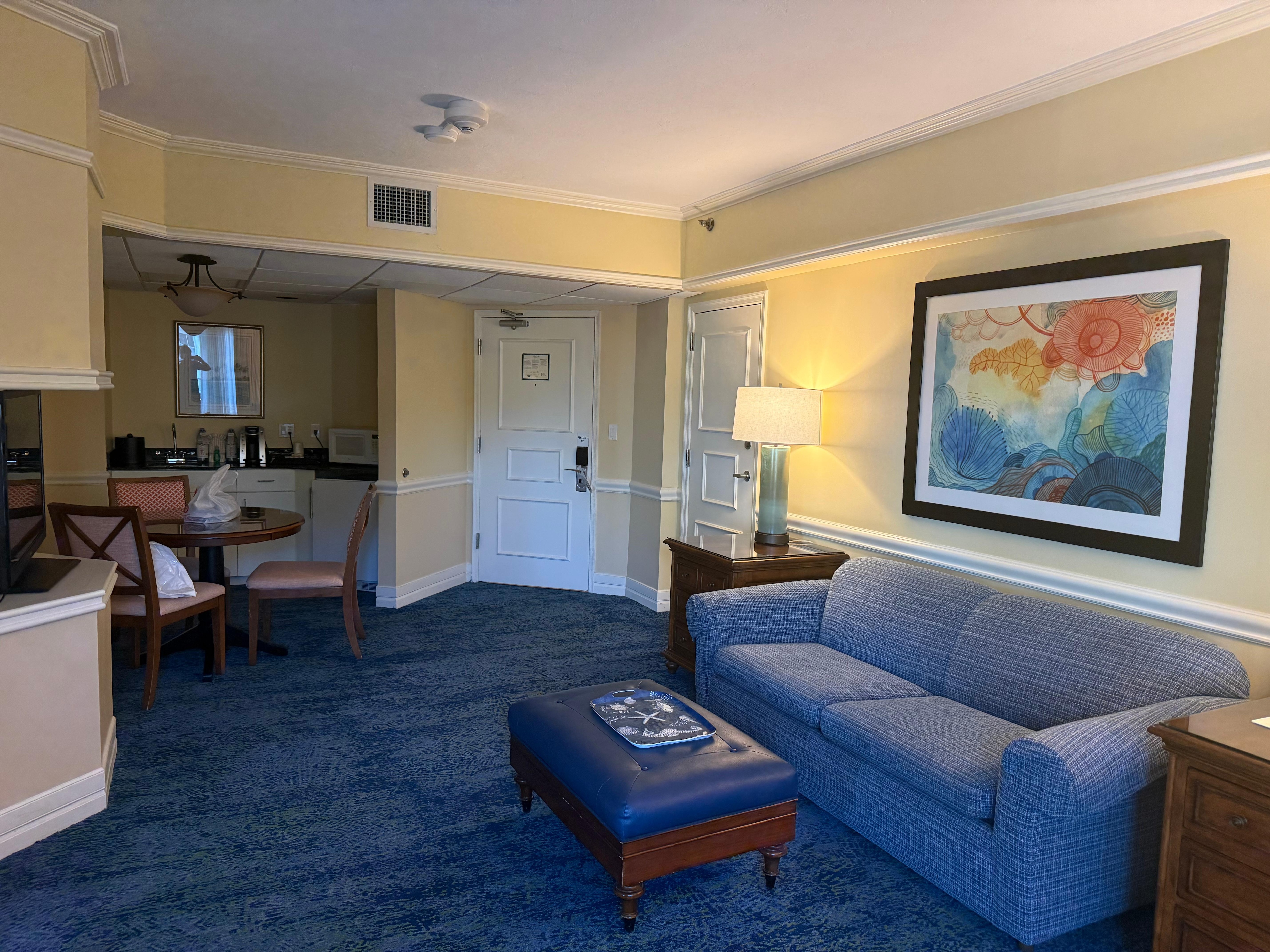 Living room with sofa bed and large TV