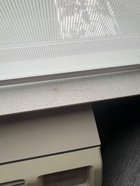 clumps of hair above AC Unit