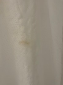 Brown spots on the shower curtain