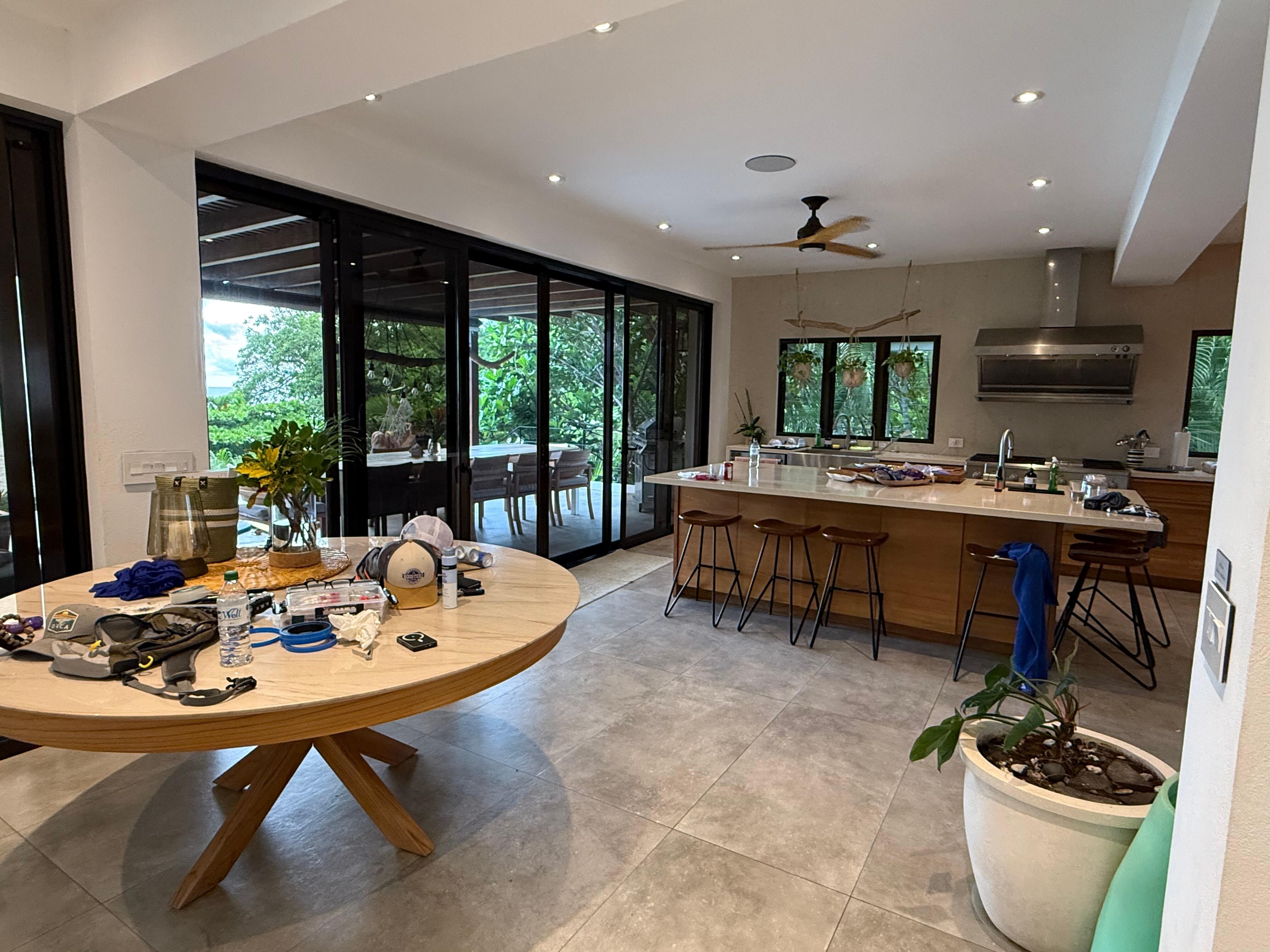 Inside dinner table (which became a catch all for us) and kitchen