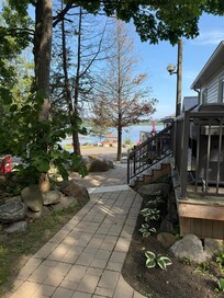 The pathway that leads past the other cottages, towards the water.