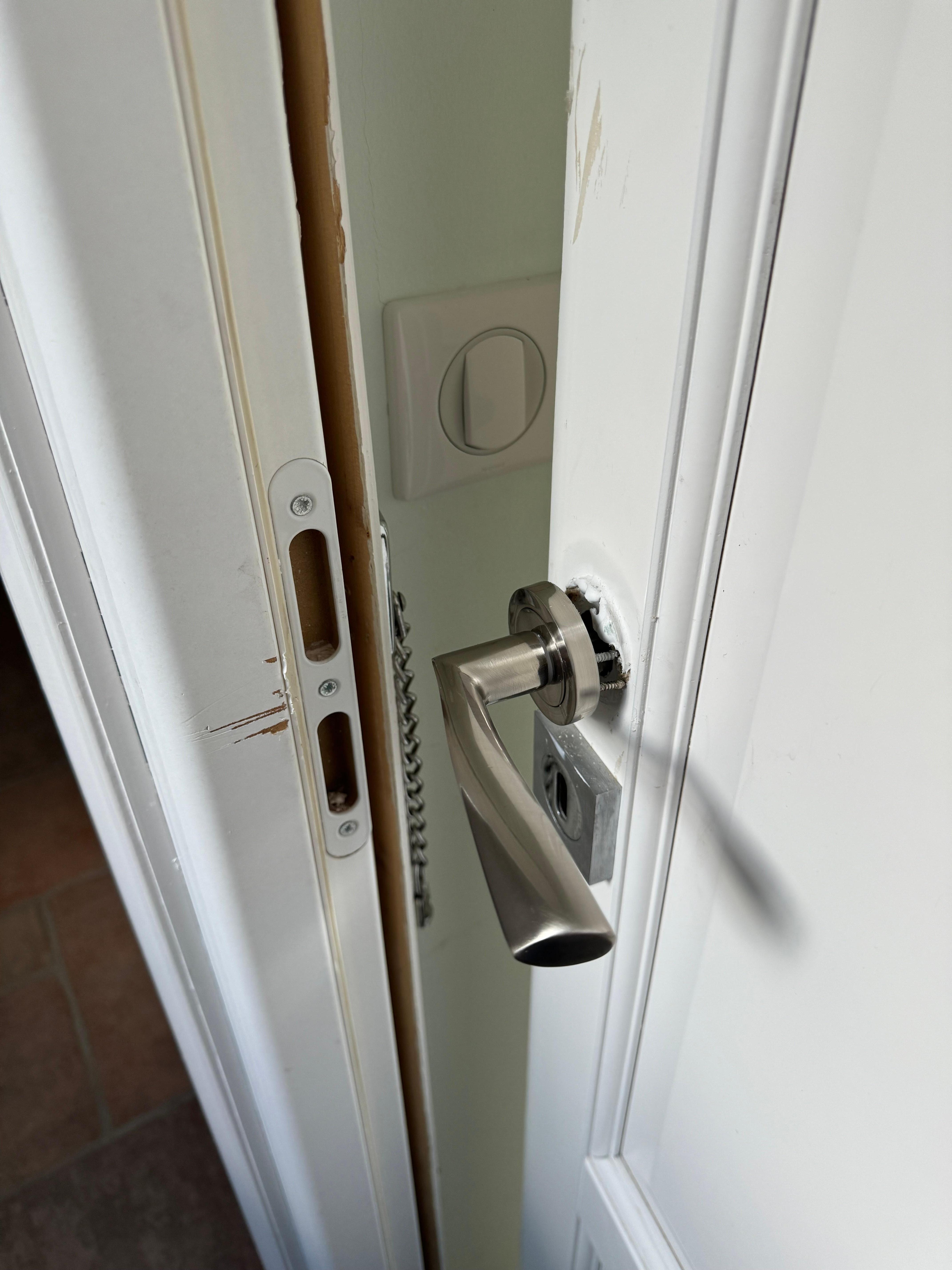 Bedroom door handle not attached to door