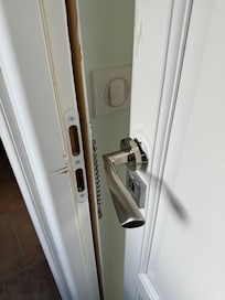 Bedroom door handle not attached to door