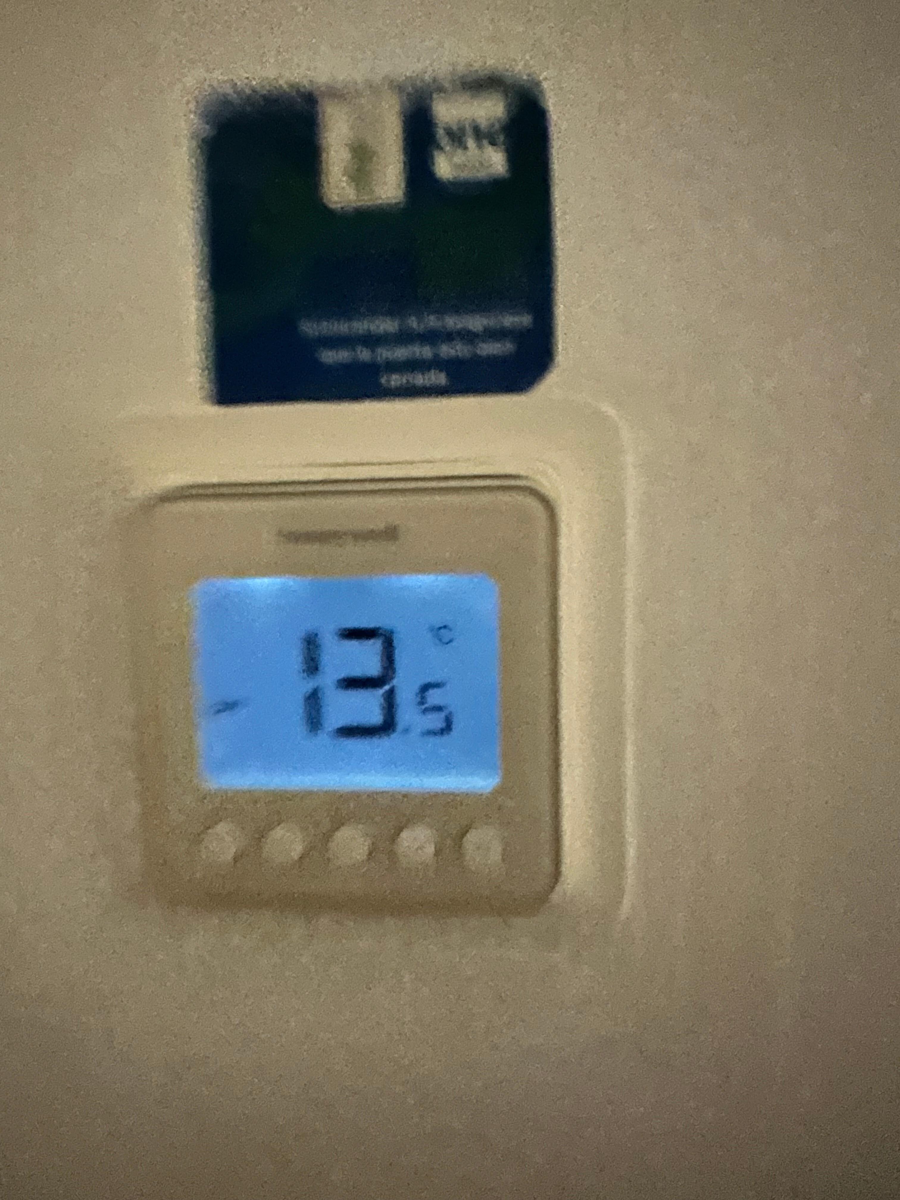 When I woke up, the thermostat was at 13° and freezing in the room