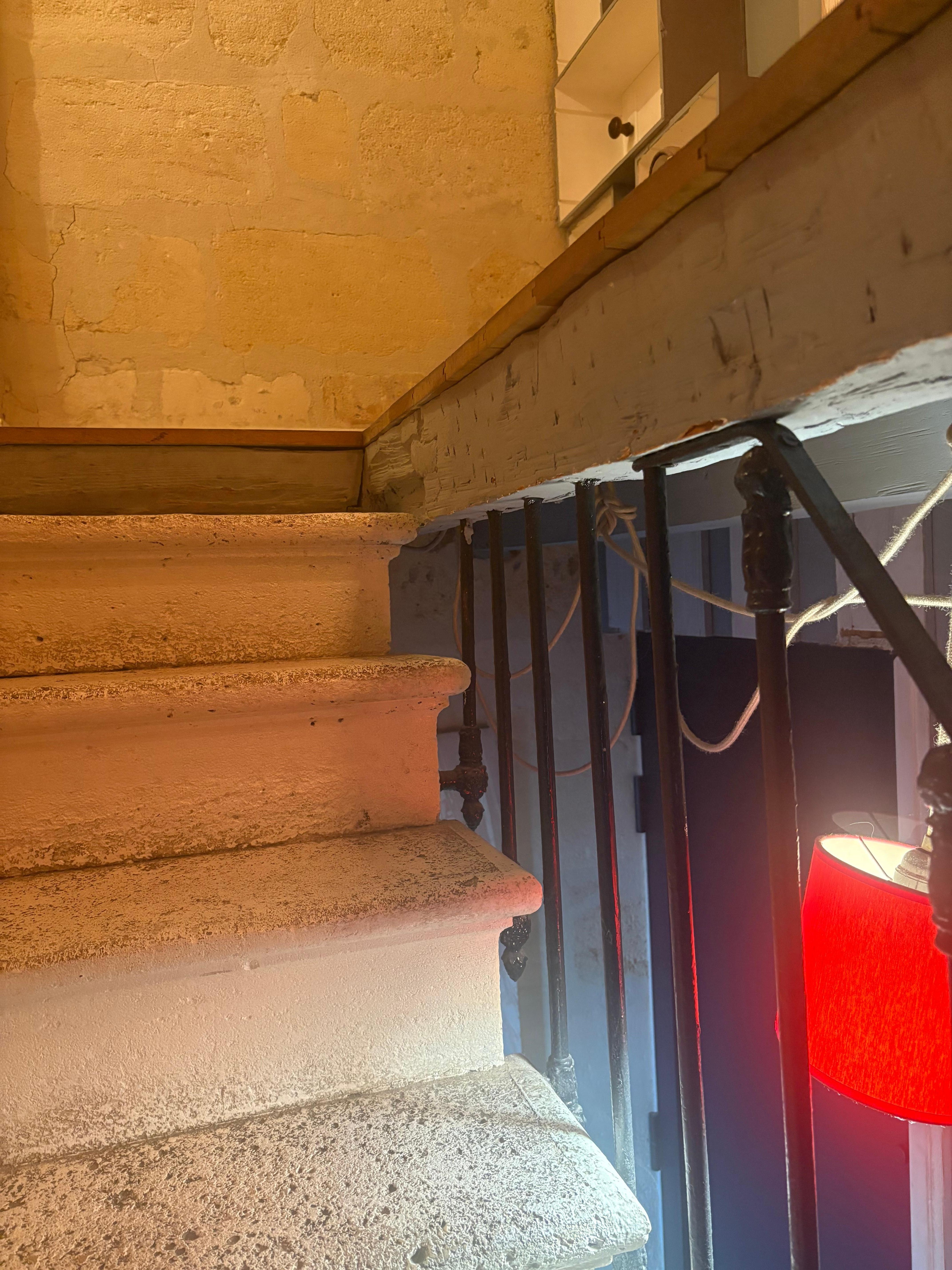 No handrail on upper part of stairs to get to attic bedrooms. 