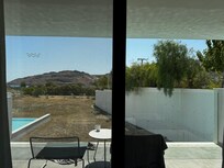 Staring at the cement wall; not sea view