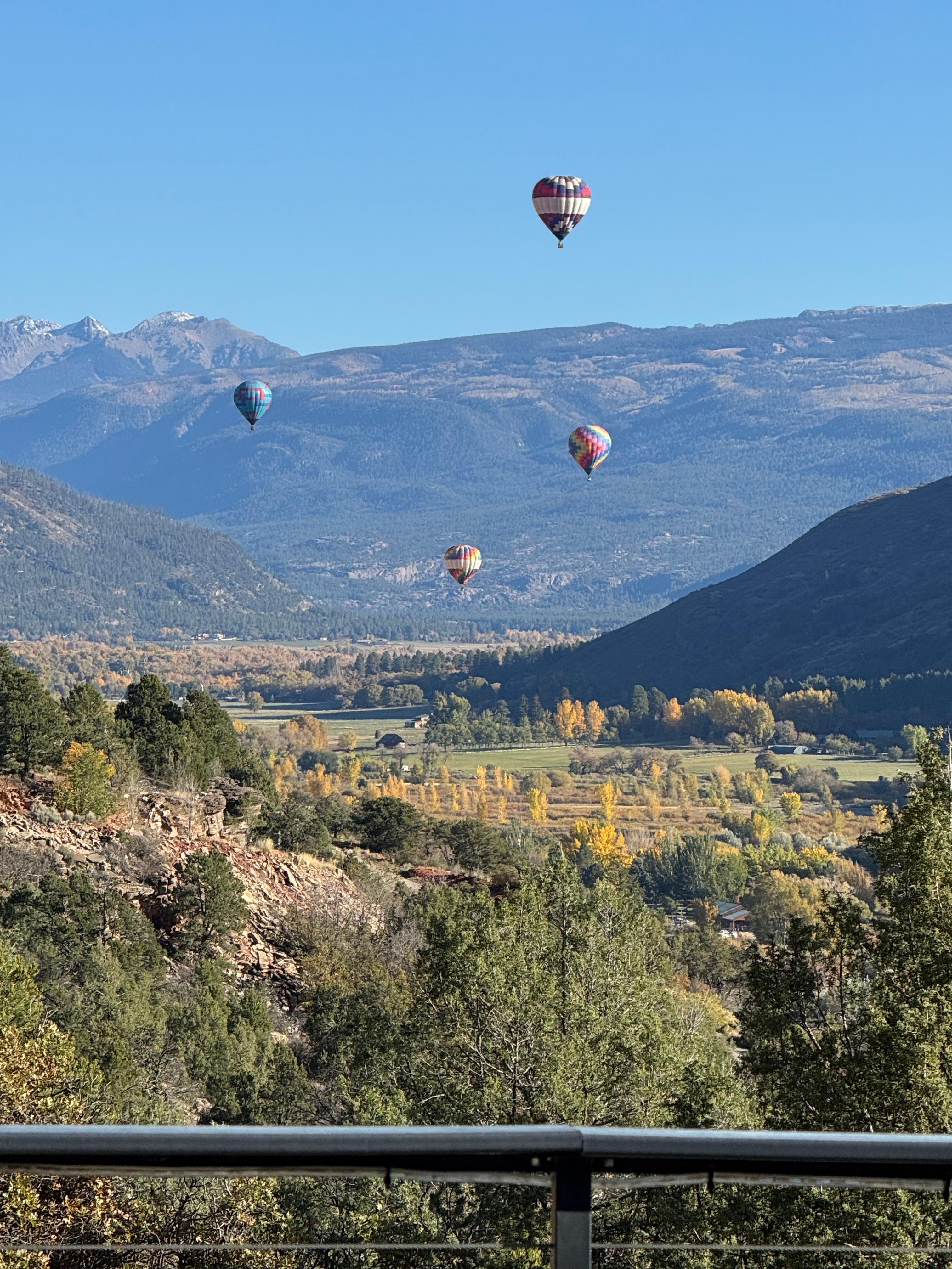 Hot air balloons view from the deck. 