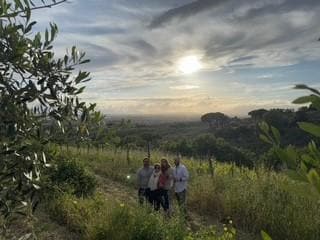 Group photo from our walk on the trail.  The views were unbelievable and we observed herds of sheep, lots of birds and beautiful plants.  Wild poppies, olive trees and jasmine were everywhere!  