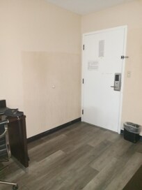 Still patchy paint and repair job on walls in room 205 I also have videos that can't be uploaded here because the files are too large.