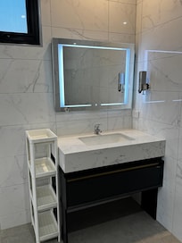 Strange storage unit next to a nice sink
