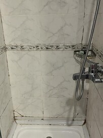 Broken bathroom + humidity stain