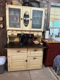 Antique cabinet with modern coffee bar