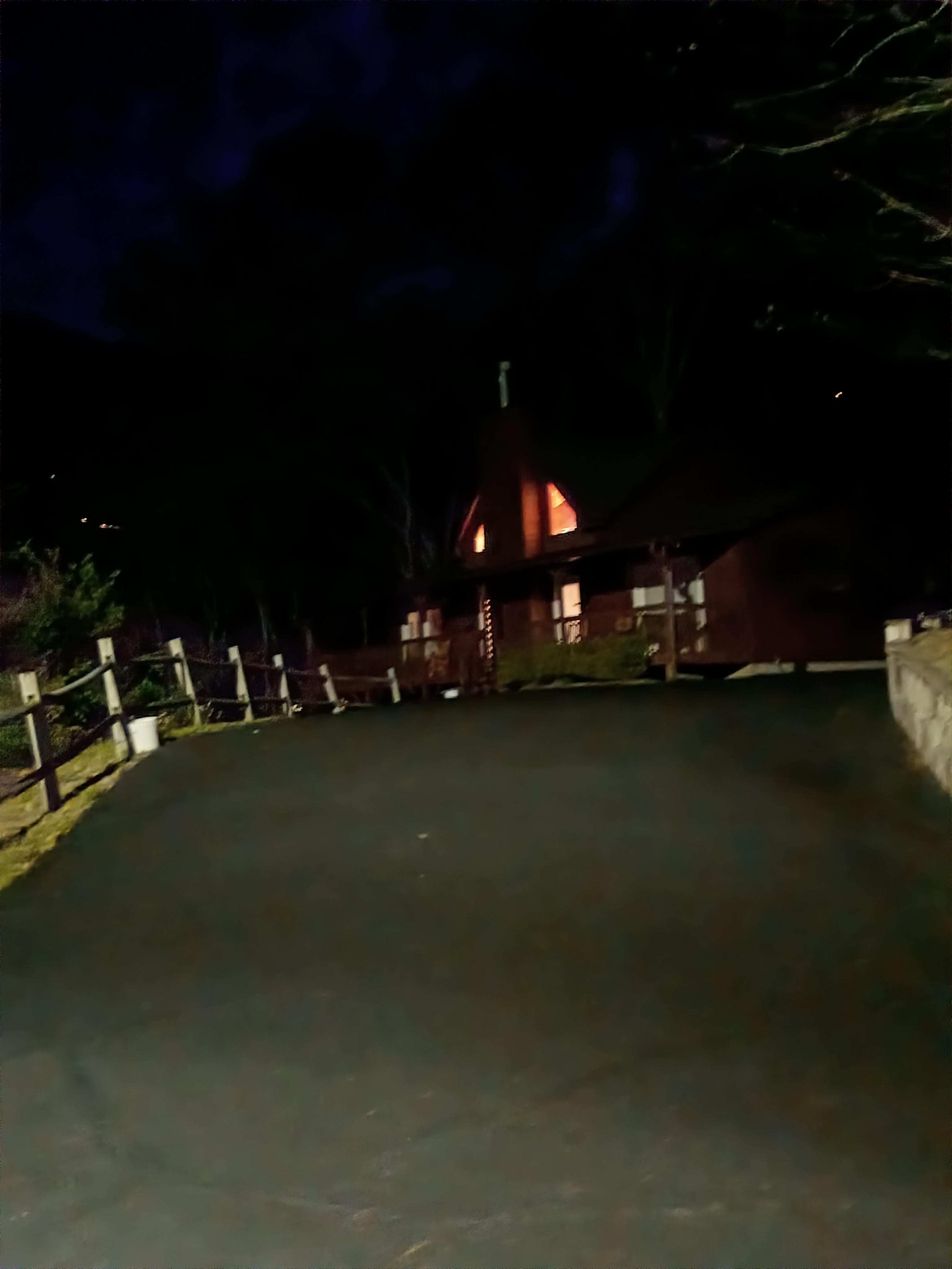 The house from the 45 degree turn in the driveway