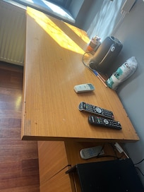 Cigarette ash on desk