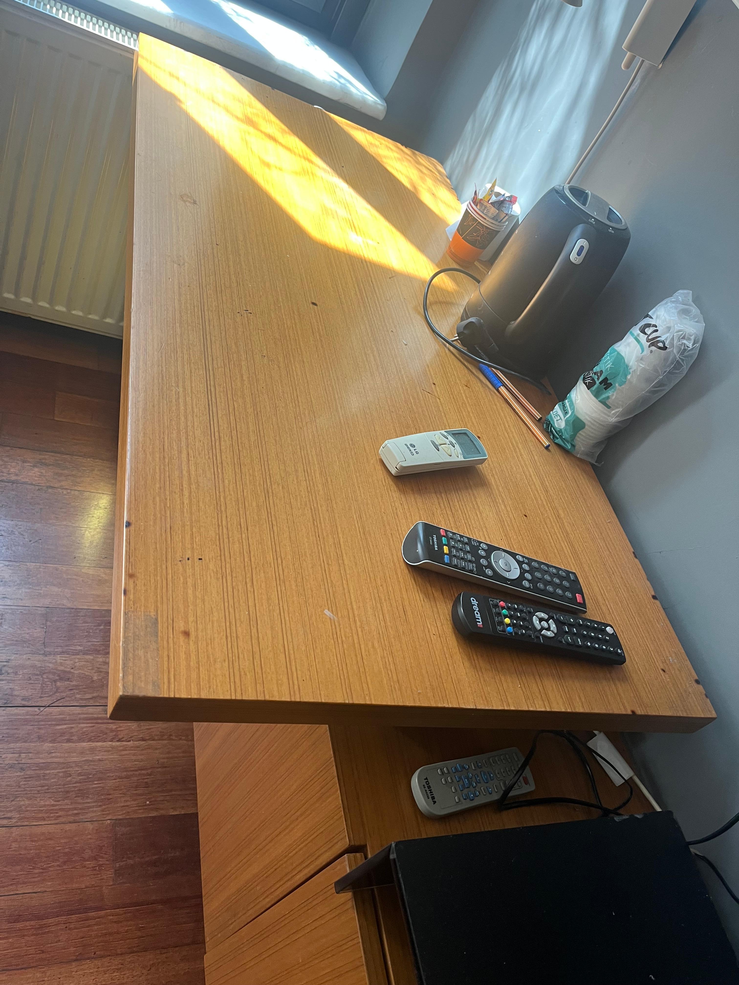 Cigarette ash on desk