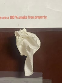 Tissue in peep hole for entry door