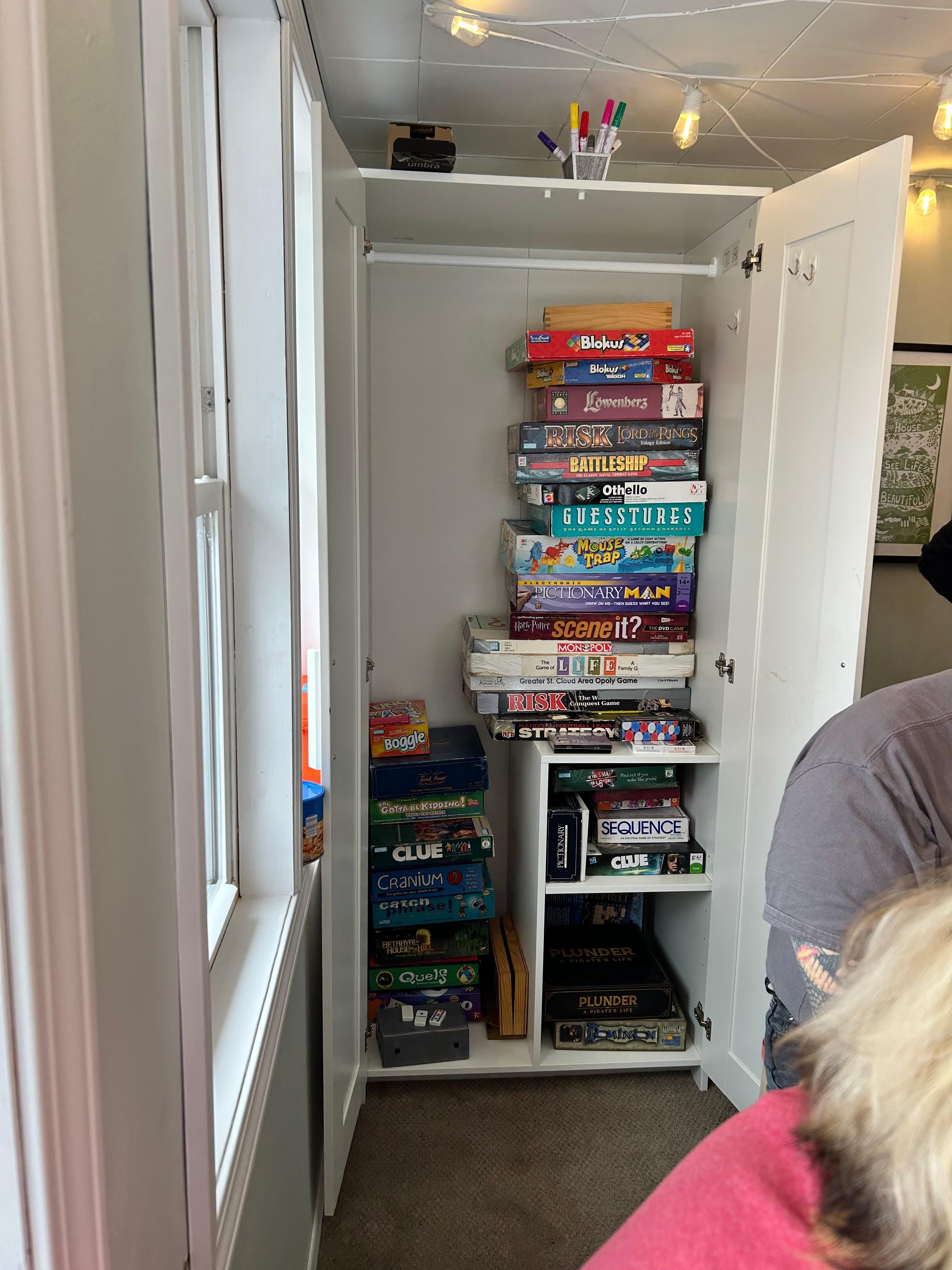 Game closet! Great long table in the dining room/ porch for games or a meal. 