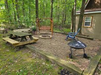 Firepit area. Firewood was provided.