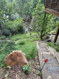 Stairs lead from the cabin down to the road where you can access the lake. You don't have to drive!