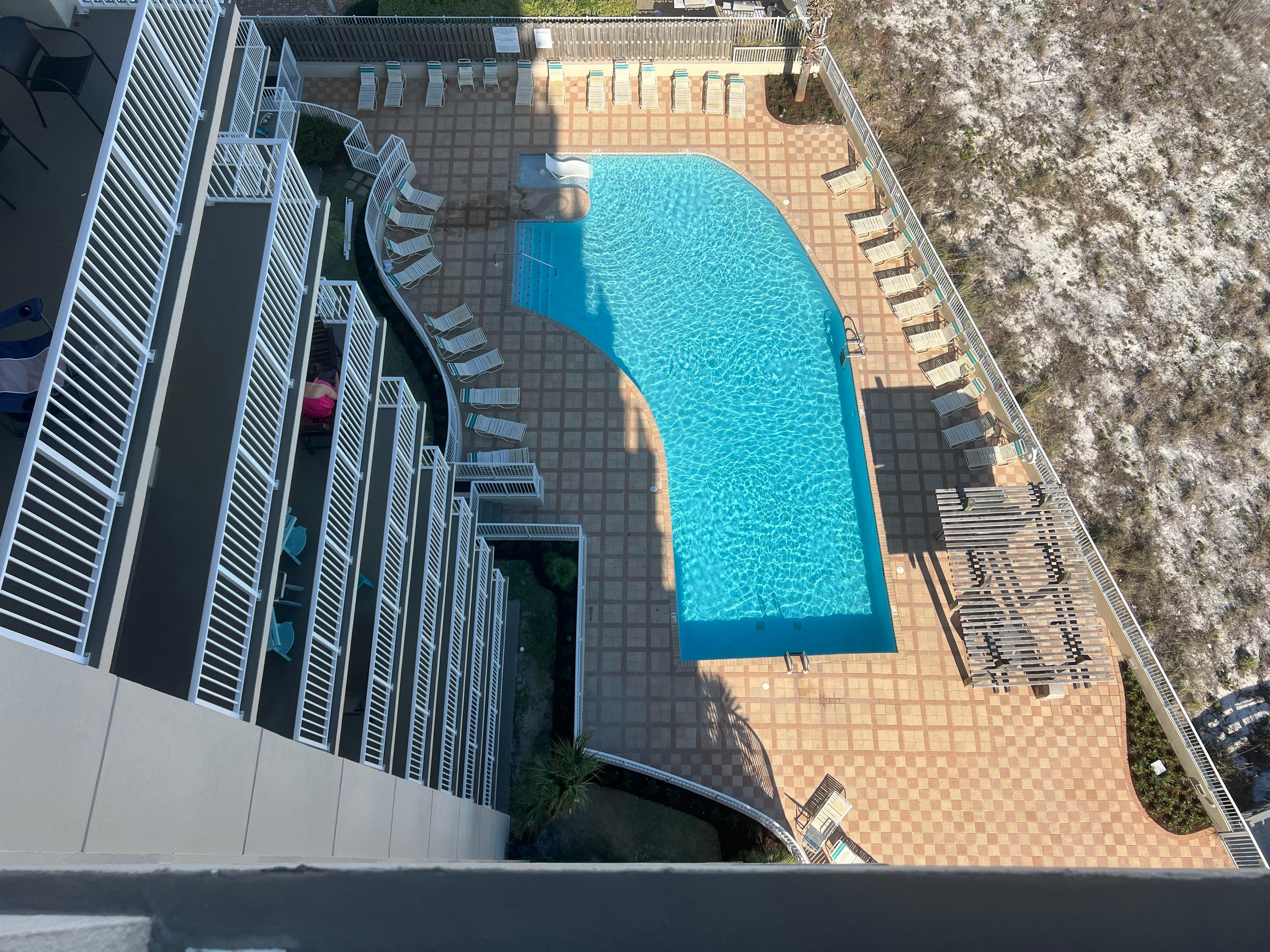 Looking down over the pool from the balcony