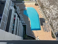 Looking down over the pool from the balcony