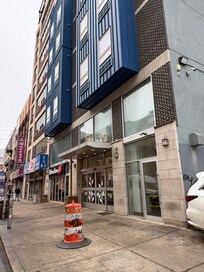 Noisy street filled with trucks constantly loading and unloading.